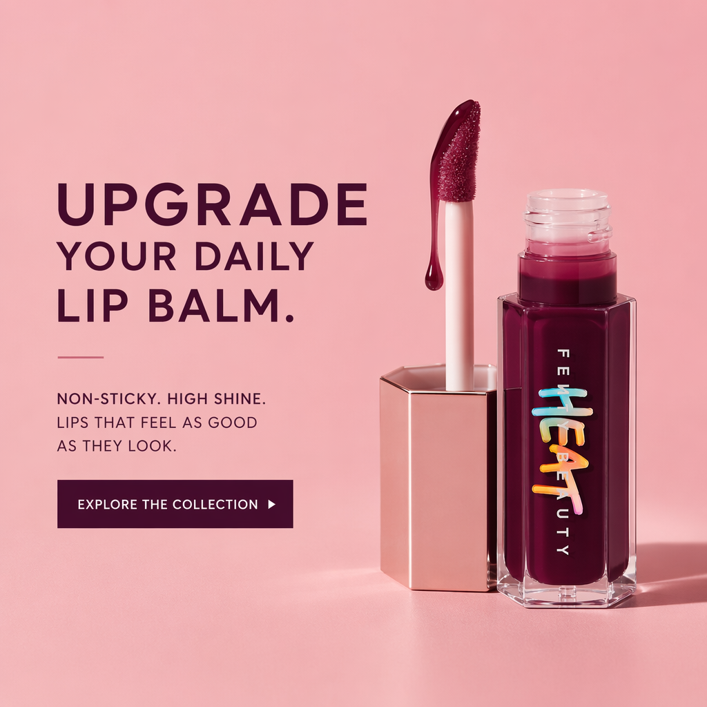 AI-generated Gloss Bomb Heat ad: the open lip gloss tube with its glossy doe-foot wand raised beside it on a soft pink background, headlined "Upgrade your daily lip balm." with the subline "Non-sticky. High shine. Lips that feel as good as they look."