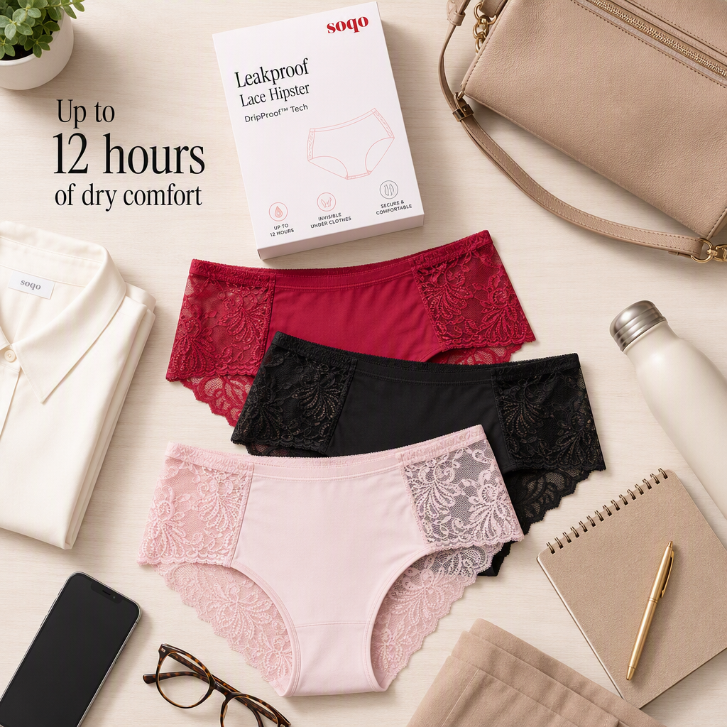 Clean 1:1 square flat lay of three Soqo leakproof lace hipsters in red, black and pink beside their box, with a shirt, water bottle, notebook and glasses arranged around them
