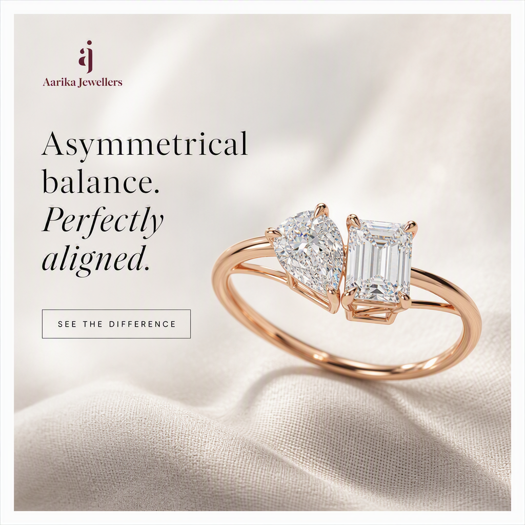 Aarika Jewellers creative featuring a pear-and-emerald-cut ring on soft ivory fabric, headlined Asymmetrical balance, perfectly aligned